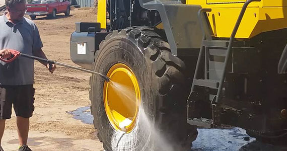 A Person Washing a Truck