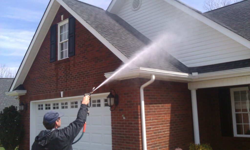 House Power Washing by a Technician